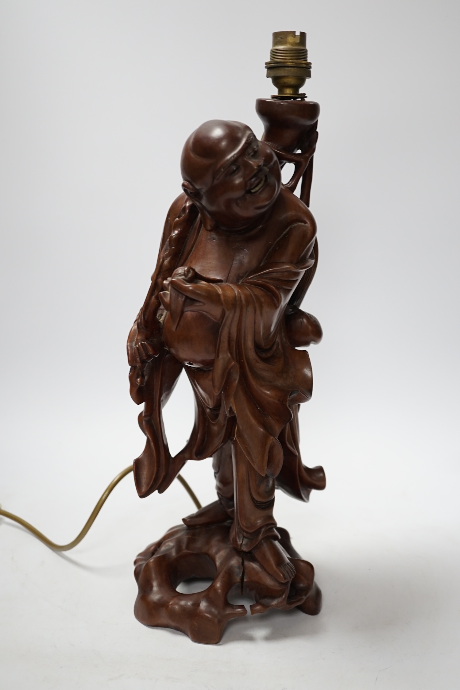 A Chinese carved hardwood figural table lamp base 42cm high